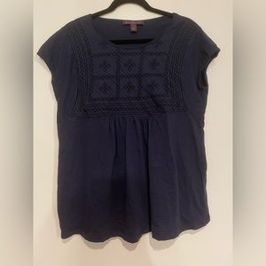 Navy women’s shirt with black embroidered details